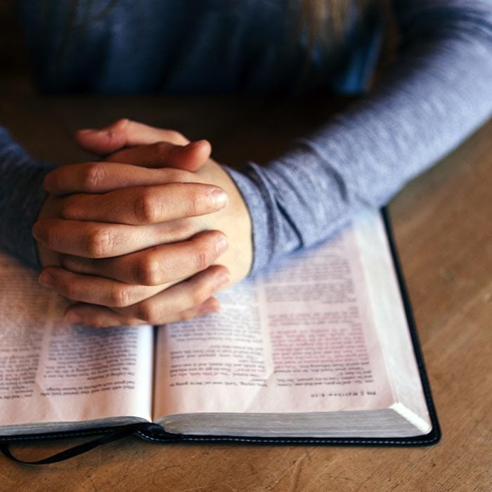 praying with bible open-sq